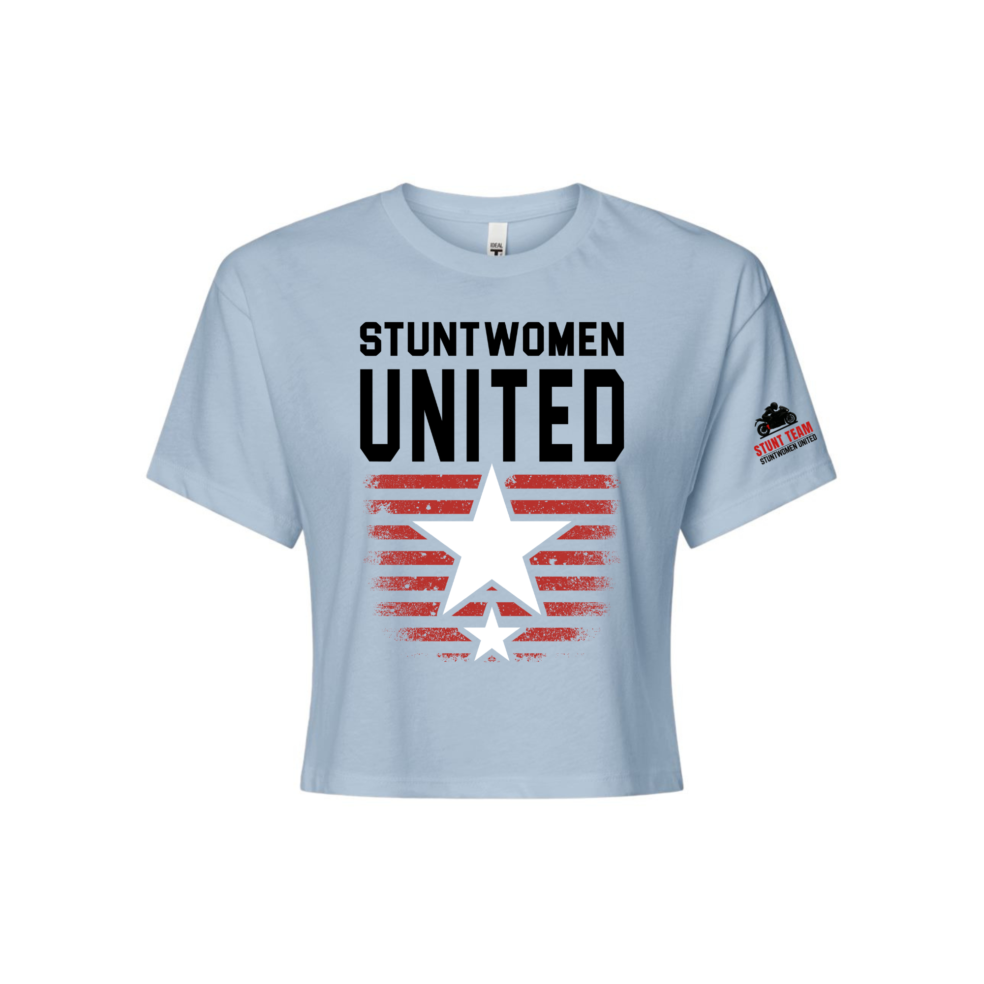 Stuntwomen United light blue women’s cropped T-shirt shown from the front, featuring bold STUNTWOMEN UNITED text with distressed red stripe star graphic and Stunt Team sleeve logo.