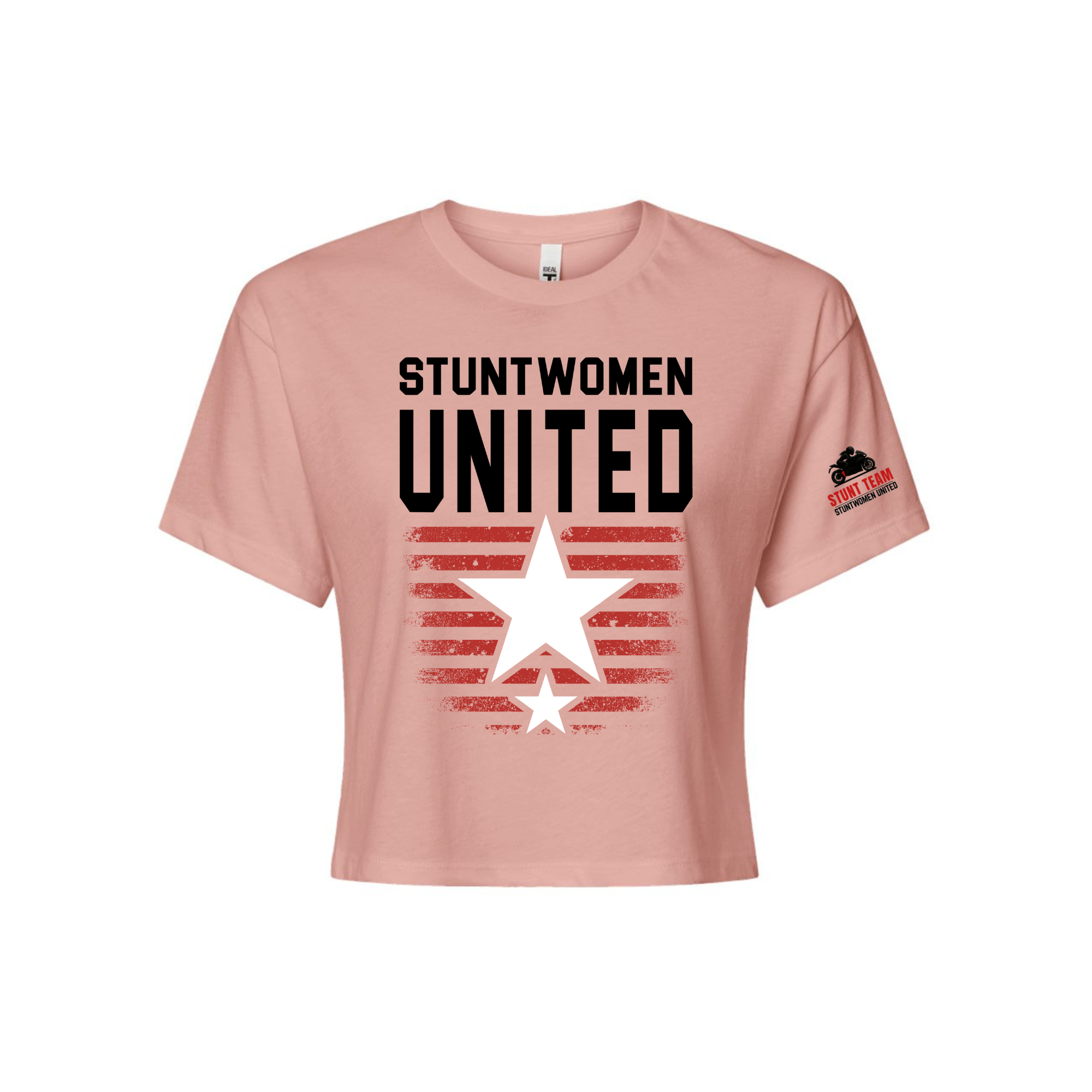 Stuntwomen United light pink women’s cropped T-shirt shown from the front, featuring bold STUNTWOMEN UNITED text with distressed red stripe star graphic and Stunt Team sleeve logo.