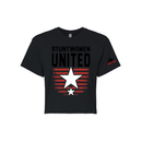 Stuntwomen United black women’s cropped T-shirt shown from the front, featuring bold STUNTWOMEN UNITED text with distressed red stripe star graphic and Stunt Team sleeve logo.