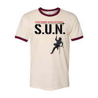Stuntwomen United S.U.N. graphic ringer t-shirt shown in cream with maroon collar and stuntwoman design.