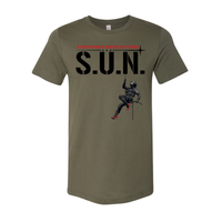 Stuntwomen United graphic t-shirt in green featuring the stuntwoman rappelling logo design.